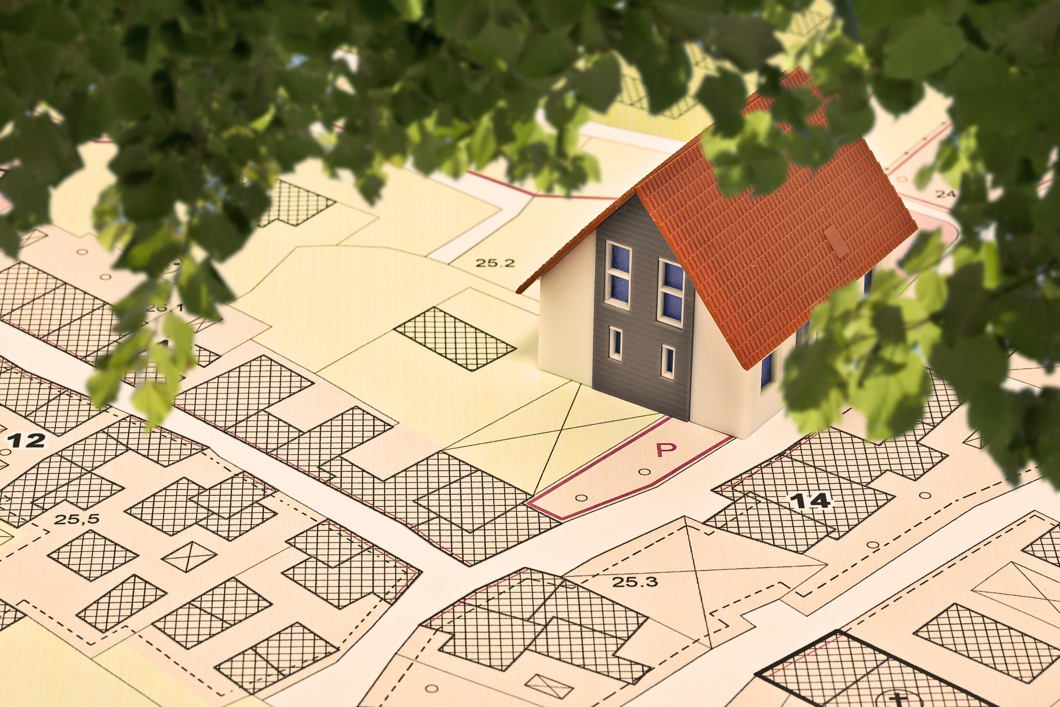 hardship application Model house on a land planning map